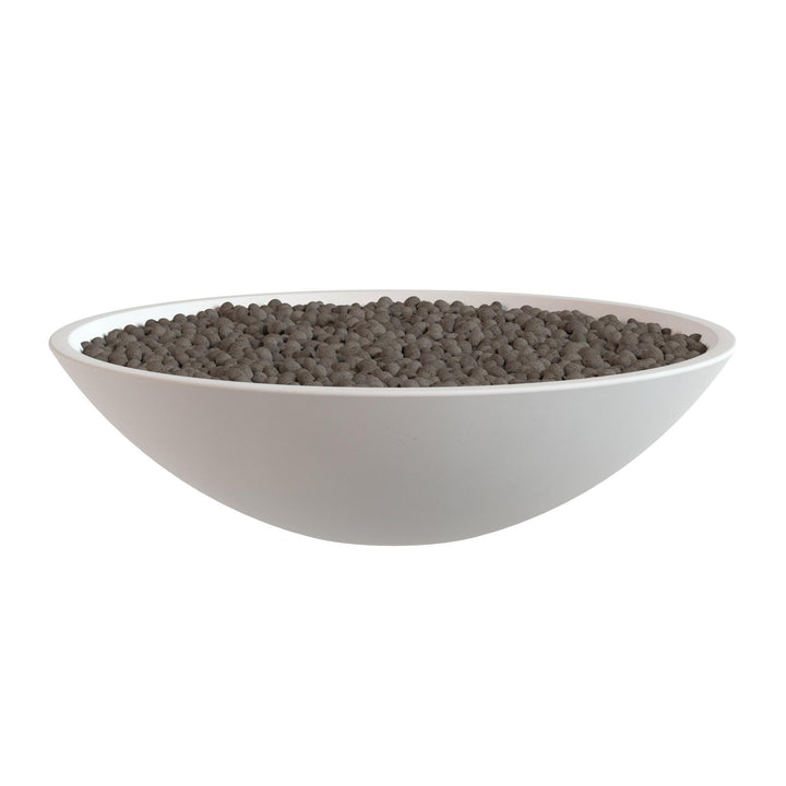 A white bowl filled with dark brown grains or seeds, such as coffee beans or cocoa beans.