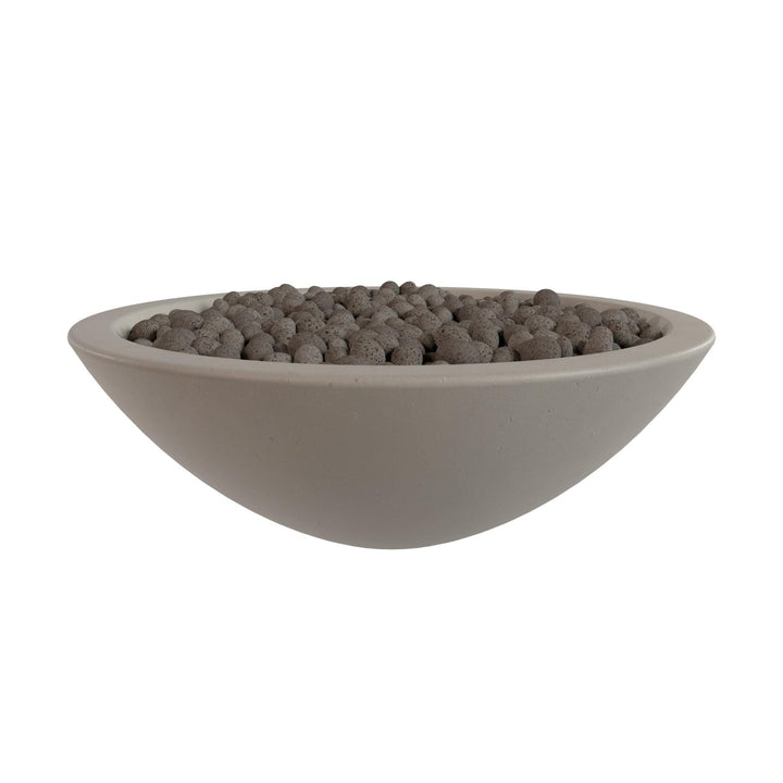 A white bowl filled with small, round objects, possibly stones or pebbles, is shown against a white background.