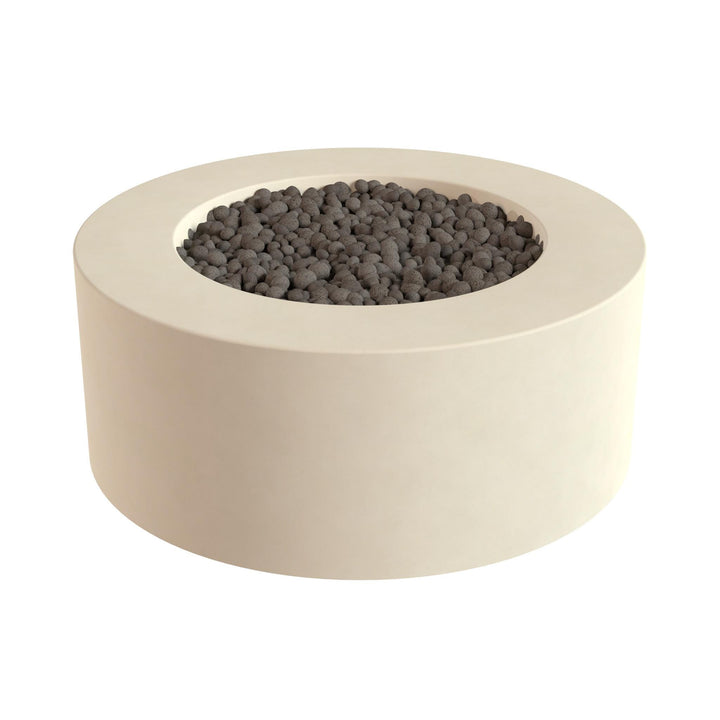 A white, circular planter filled with small, dark-colored stones or pebbles.