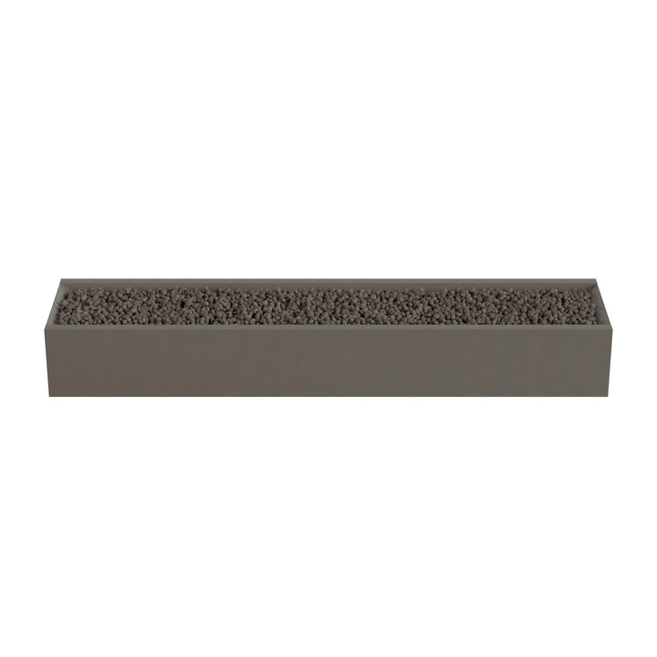 A rectangular planter box filled with small rocks or pebbles.