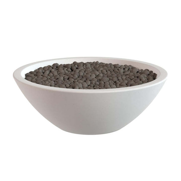 A white bowl filled with dark brown pebbles or stones.