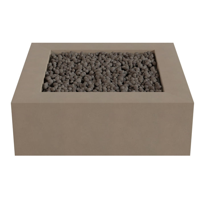 A rectangular concrete planter filled with small gray stones or pebbles.