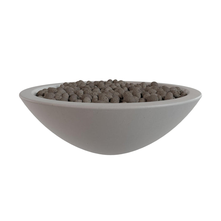 A white bowl filled with small, round objects, possibly stones or pebbles, is shown against a white background.