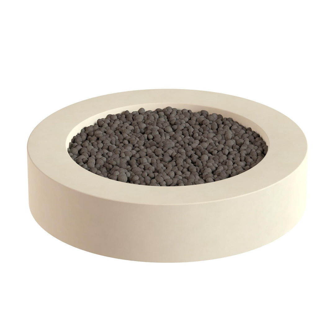 A white, circular container filled with small, dark-colored stones or pebbles.