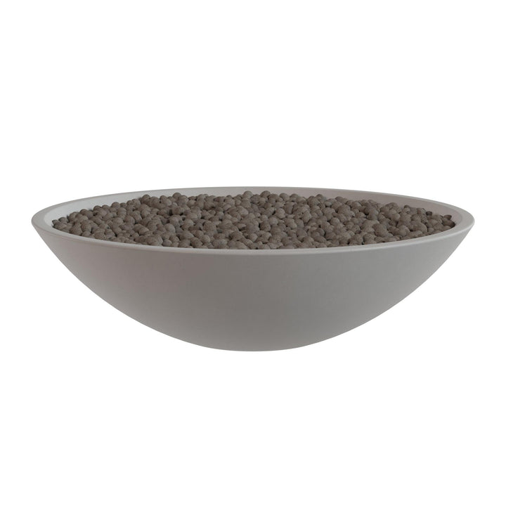 A white bowl filled with small, round objects, possibly beads or grains, is shown against a white background.