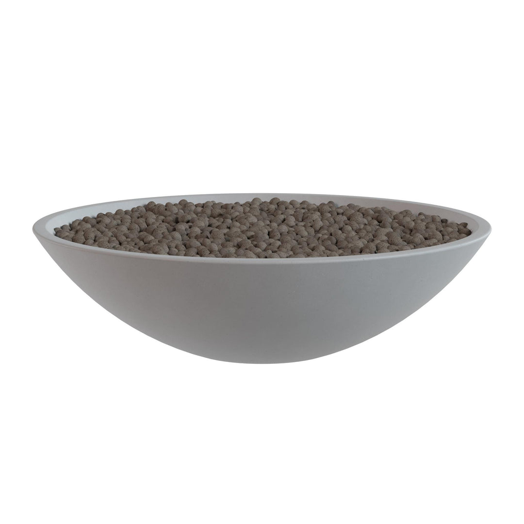 A white bowl filled with small, round objects, possibly beads or grains, is shown against a white background.