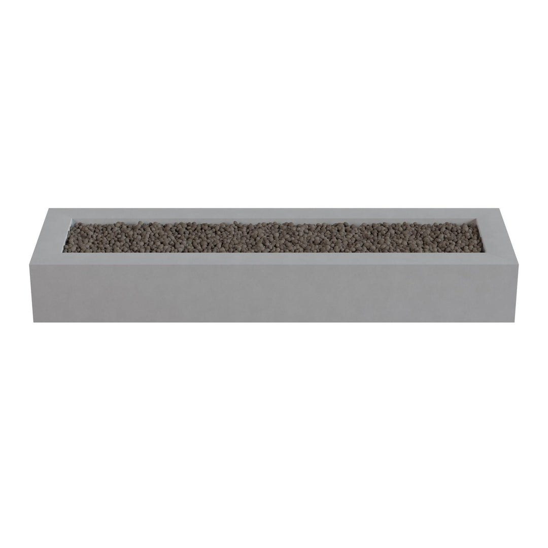 A rectangular concrete planter filled with small rocks or pebbles.