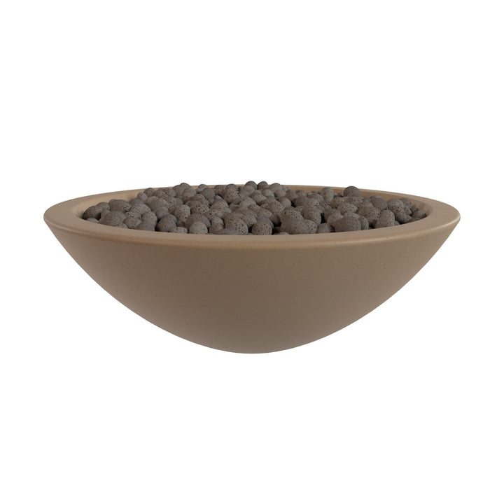 A large, round bowl filled with small, dark-colored stones or pebbles.