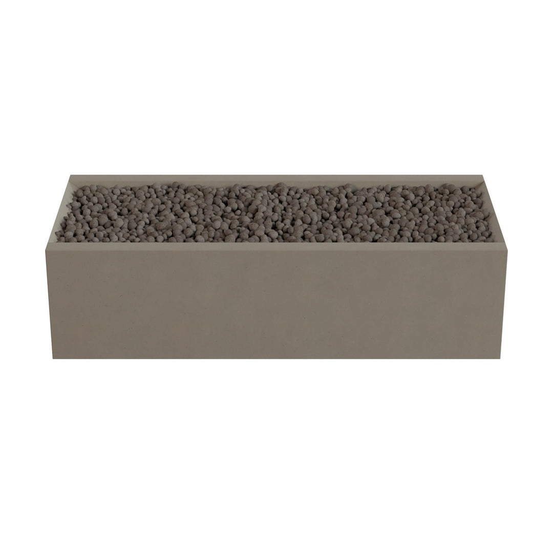 A rectangular planter box filled with small rocks or pebbles.