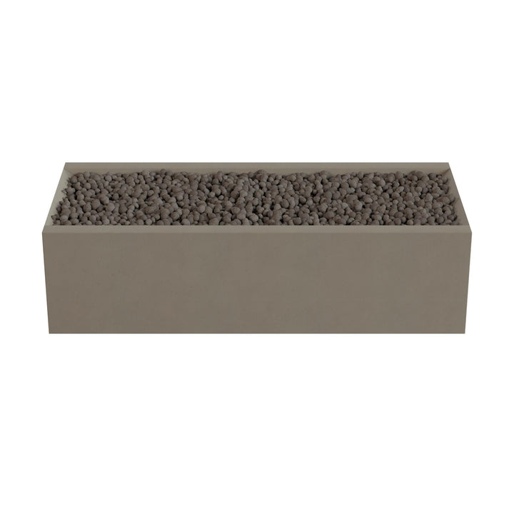 A rectangular planter box filled with small rocks or pebbles.