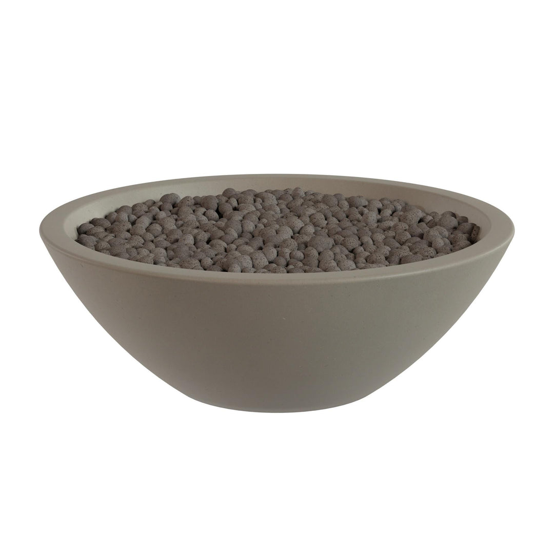 A large, round bowl filled with small, dark-colored stones or pebbles.