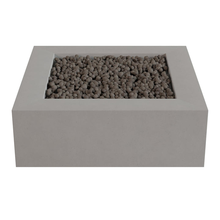 a rectangular concrete planter filled with small rocks or pebbles.
