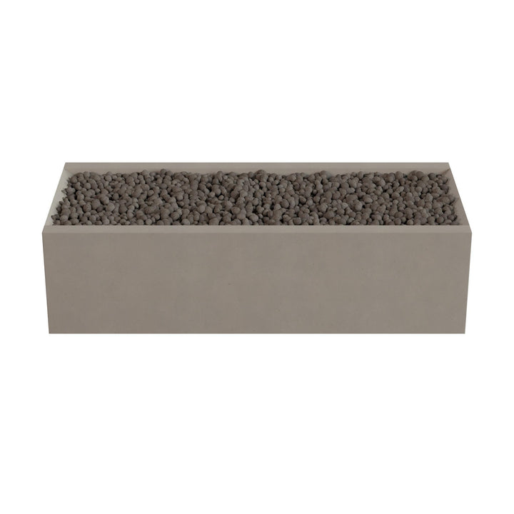 A rectangular planter box filled with small rocks or pebbles.