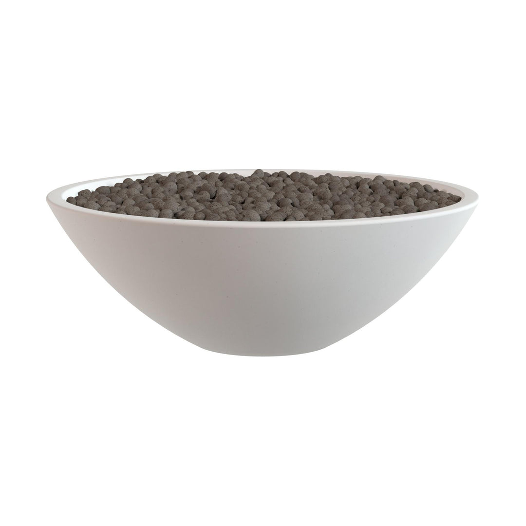A white bowl filled with dark brown pebbles or stones.