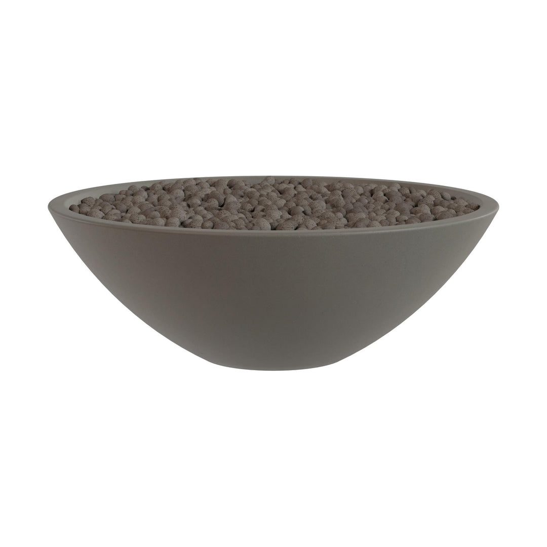 A gray bowl filled with small, round objects, possibly beads or stones.