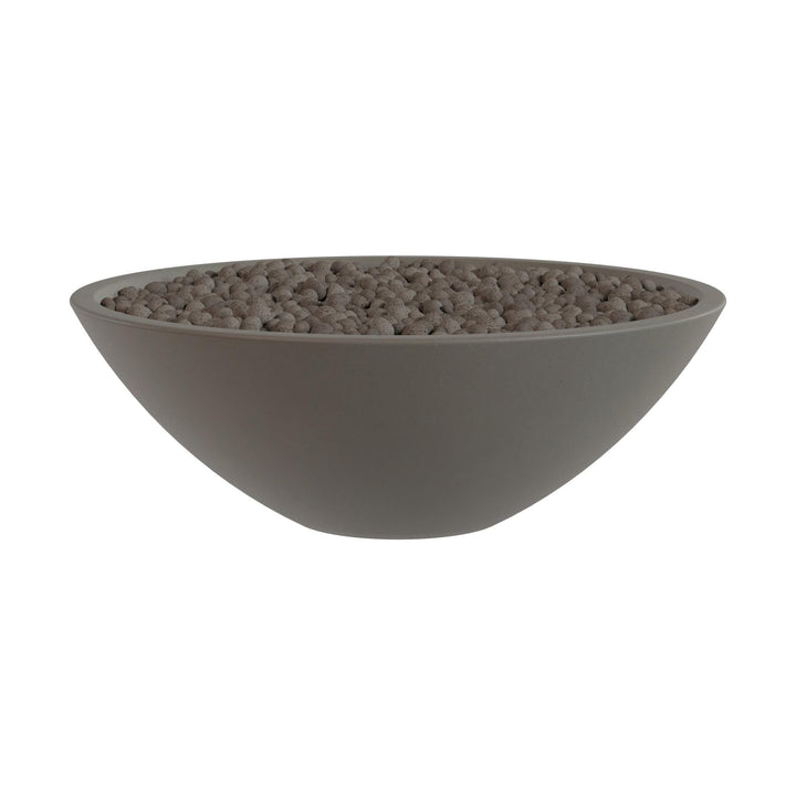 A gray bowl filled with small, round objects, possibly beads or stones.