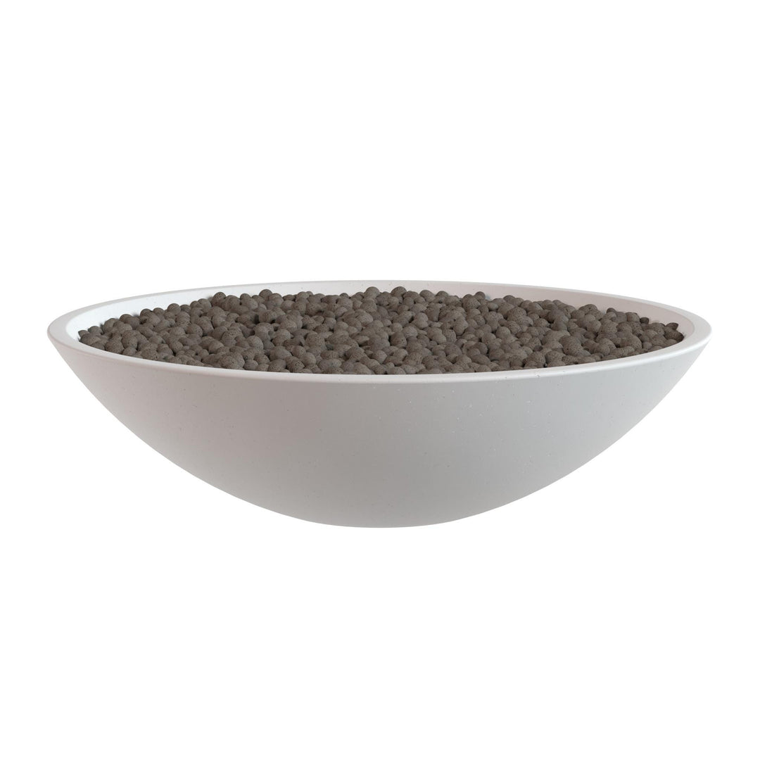 A white bowl filled with dark brown grains or seeds, such as coffee beans or cocoa beans, is shown against a white background.