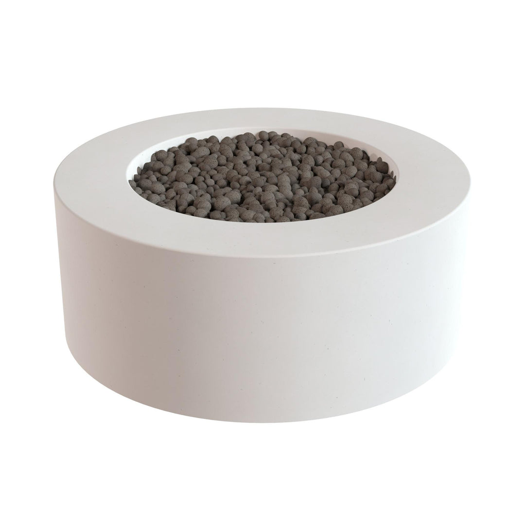 a white circular planter with a hole in the center, filled with small gray stones or pebbles.