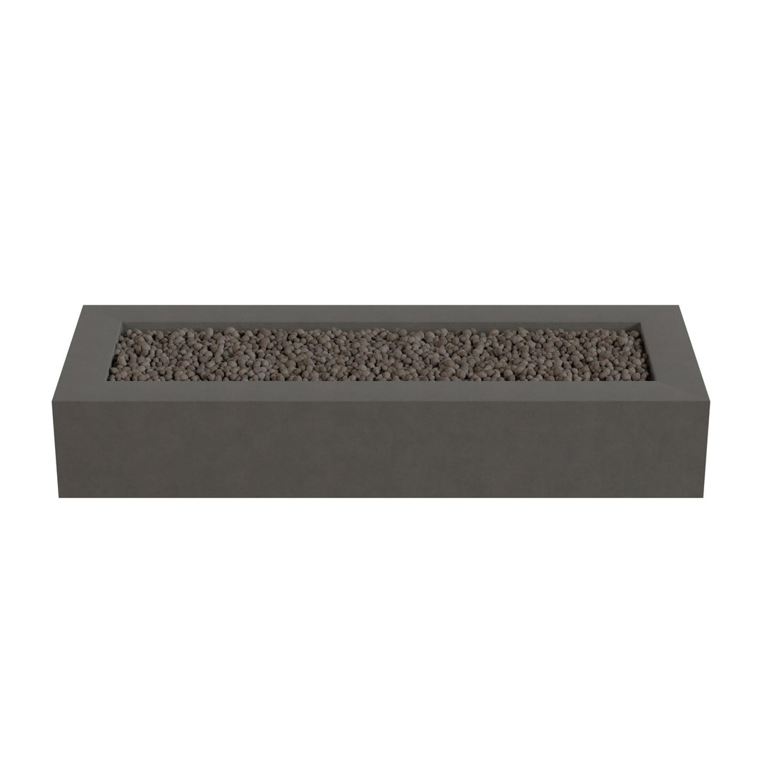 A rectangular gray planter box filled with small rocks or pebbles.