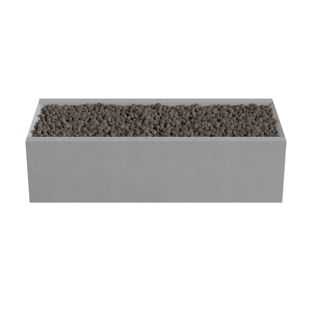A rectangular gray planter filled with small rocks or pebbles.