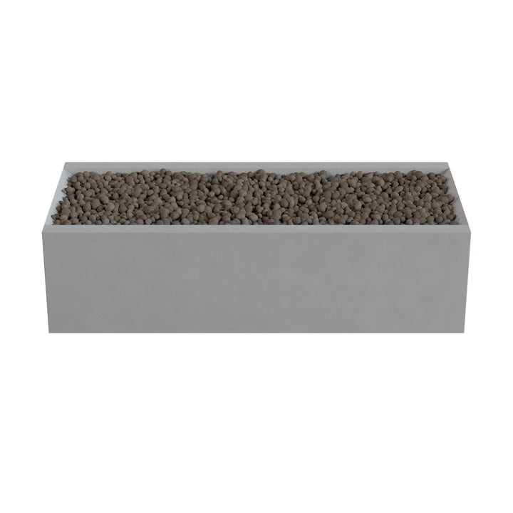 A rectangular gray planter filled with small rocks or pebbles.