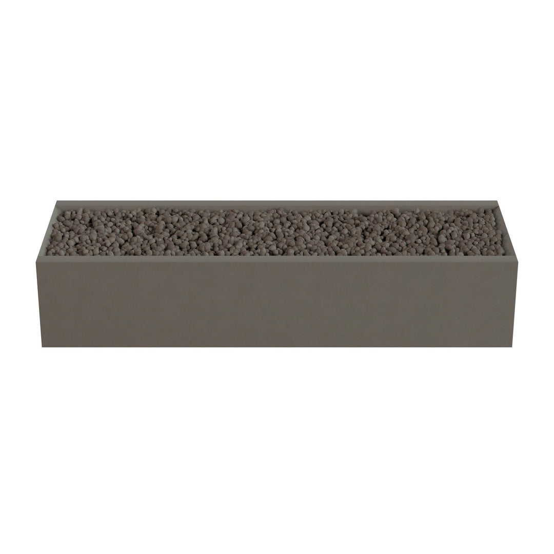 A rectangular planter box filled with small rocks or pebbles.