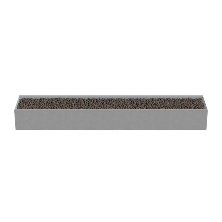 A rectangular planter box filled with small rocks or pebbles.