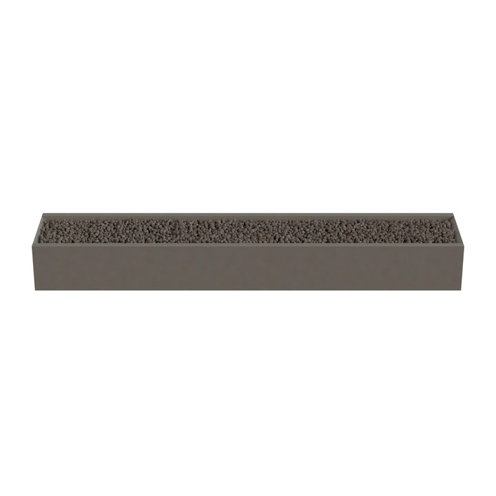 A rectangular planter box filled with small rocks or pebbles.