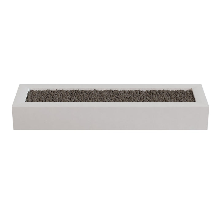 A rectangular white planter box filled with small rocks or pebbles.