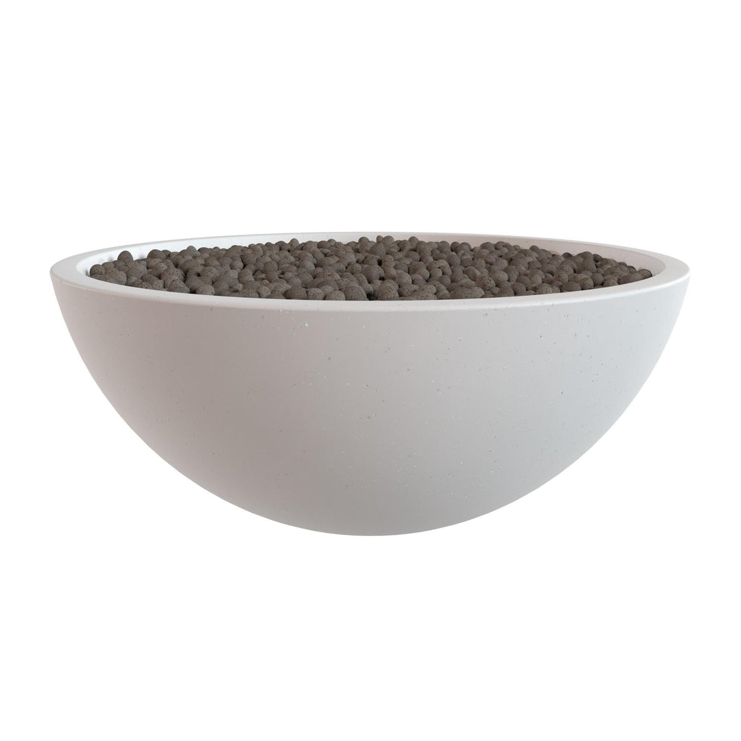 A white bowl filled with small, dark-colored objects, possibly stones or pebbles.