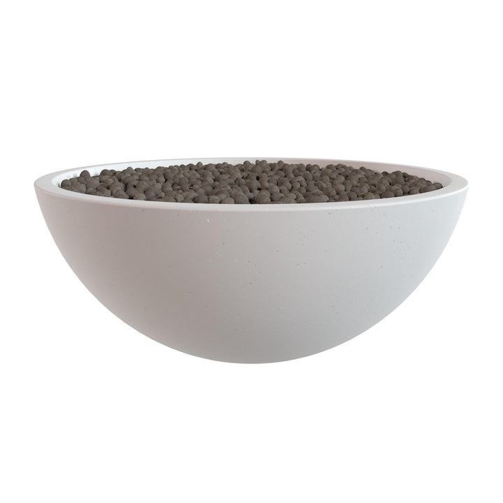 A white bowl filled with small, dark-colored objects, possibly stones or pebbles.