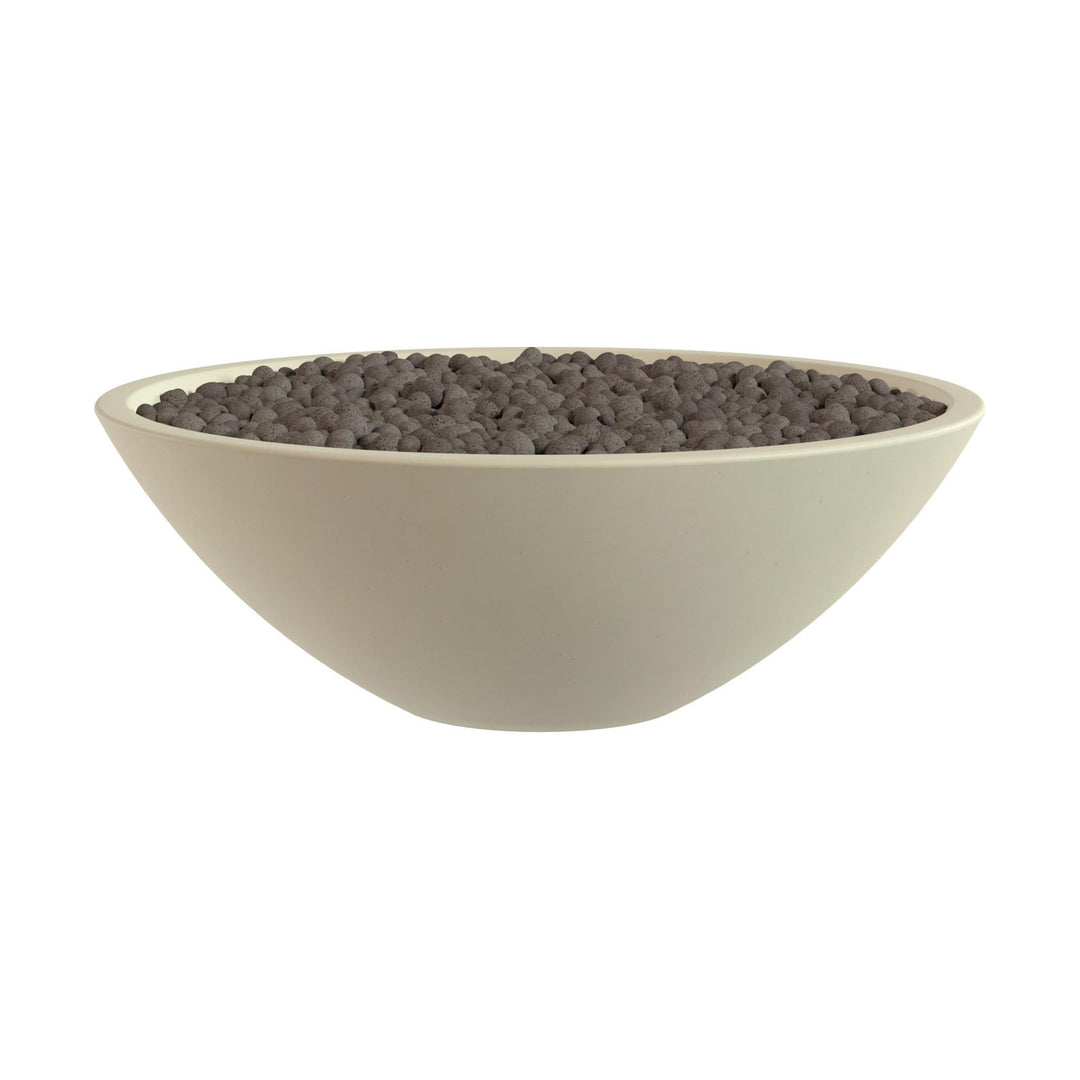 A white bowl filled with dark brown pebbles or stones.