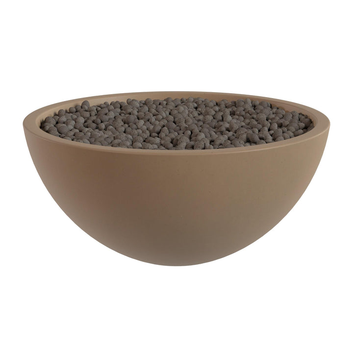 A large, round bowl filled with small, dark-colored stones or pebbles.