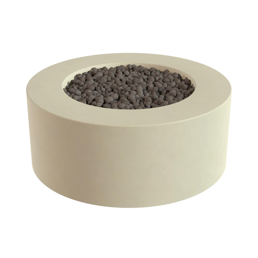 a round, white, concrete planter filled with small gray stones or pebbles.