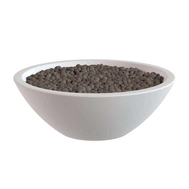 A white bowl filled with dark brown spherical objects, possibly gravel or soil.