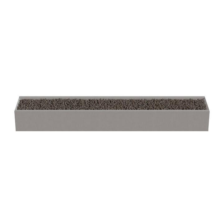 A rectangular planter box filled with small rocks or pebbles.