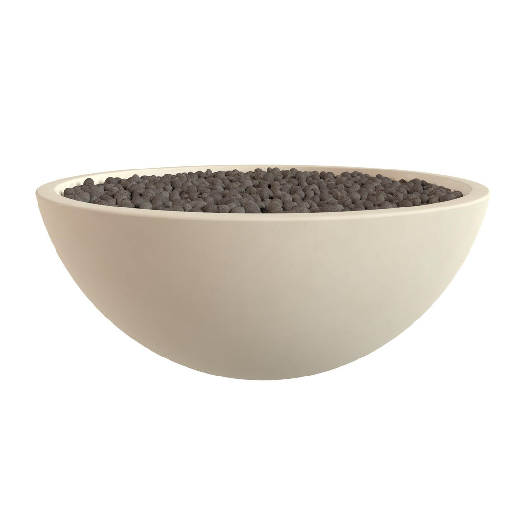 A white bowl filled with small black stones or pebbles.