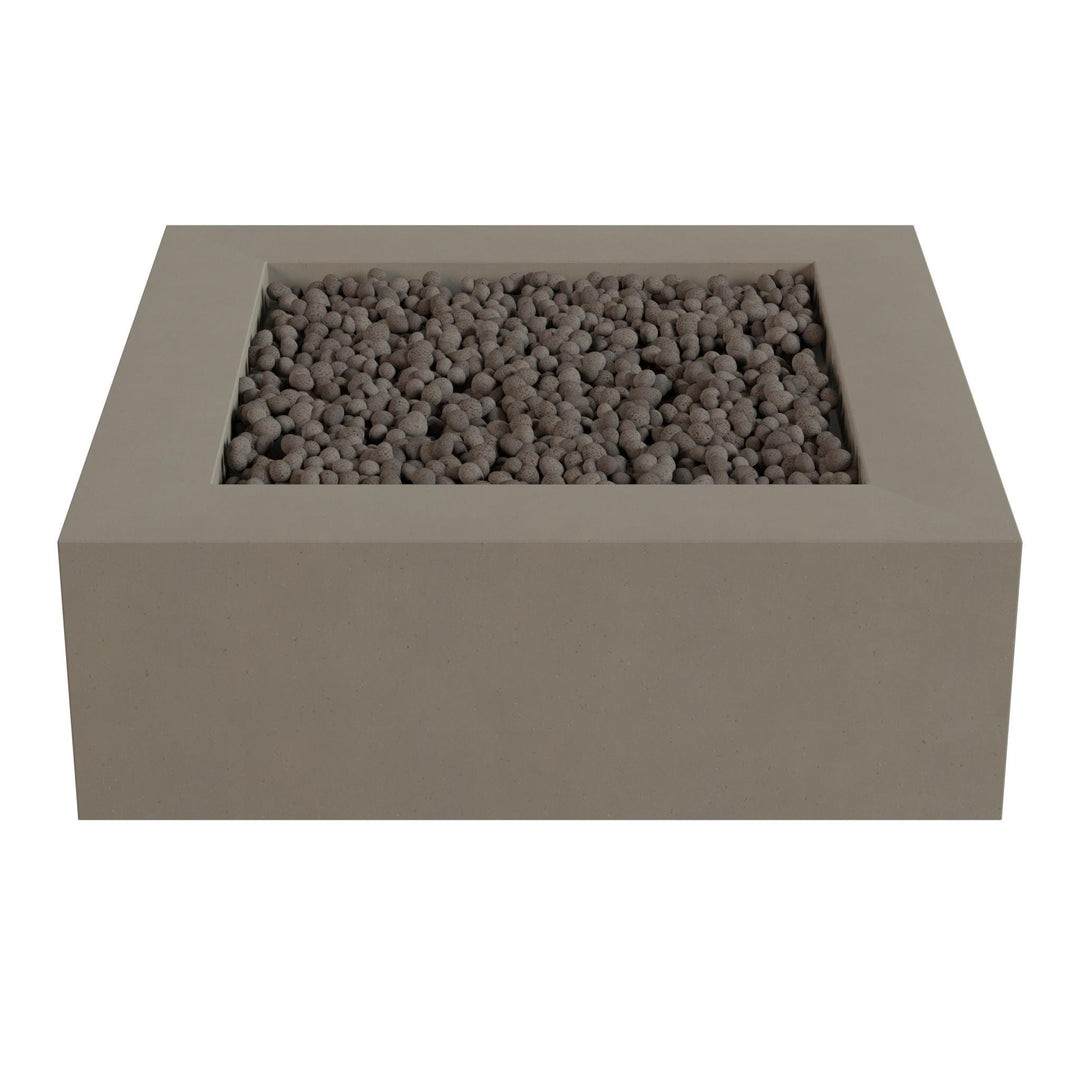 A rectangular concrete planter filled with small rocks or pebbles.