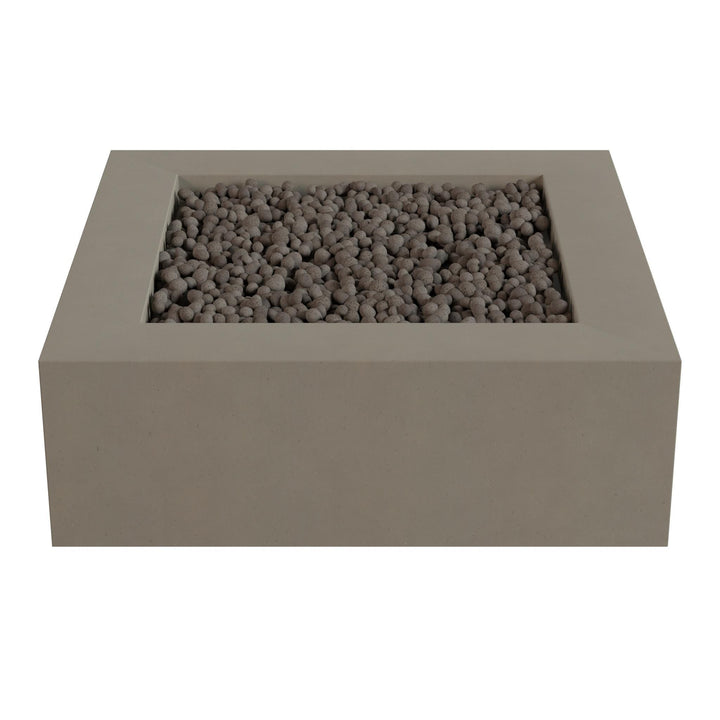 A rectangular concrete planter filled with small rocks or pebbles.
