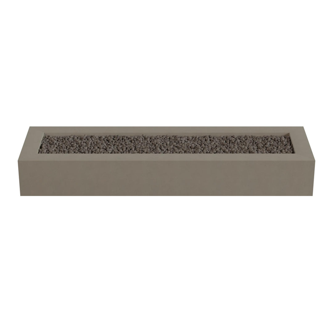 A rectangular concrete planter filled with small rocks or pebbles.
