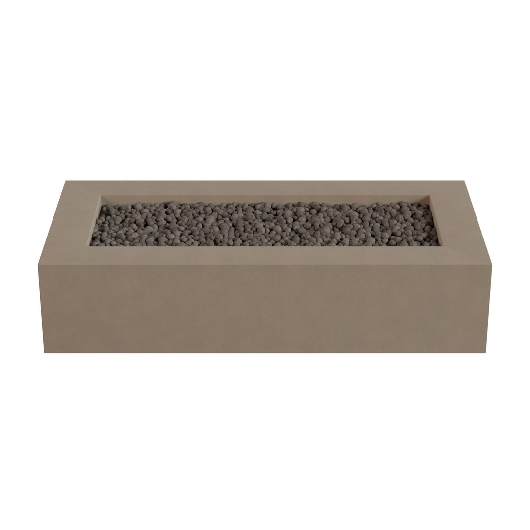 A rectangular concrete planter filled with small gray stones or pebbles.