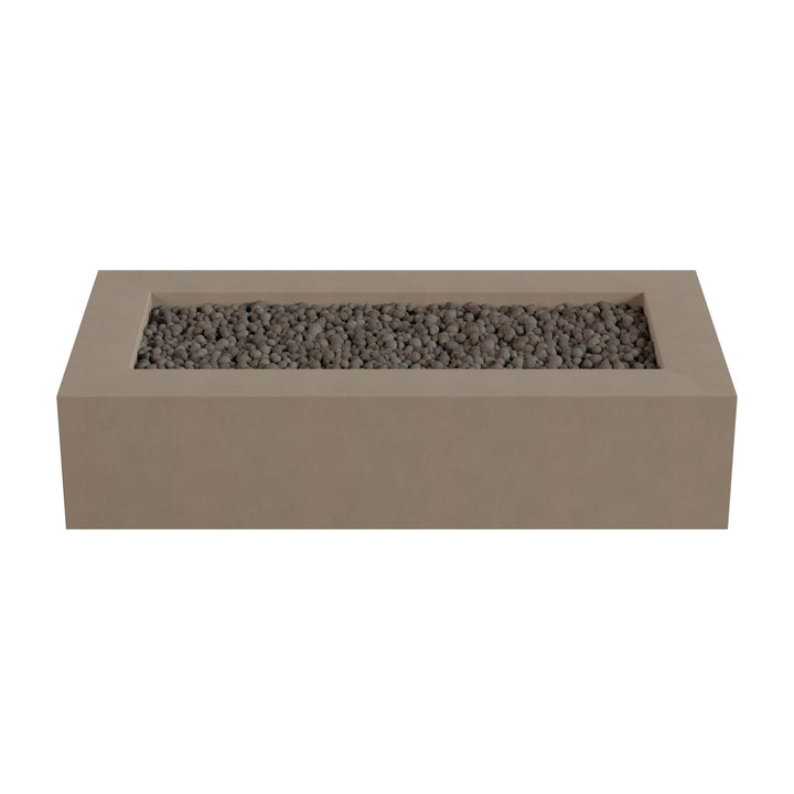 A rectangular concrete planter filled with small gray stones or pebbles.