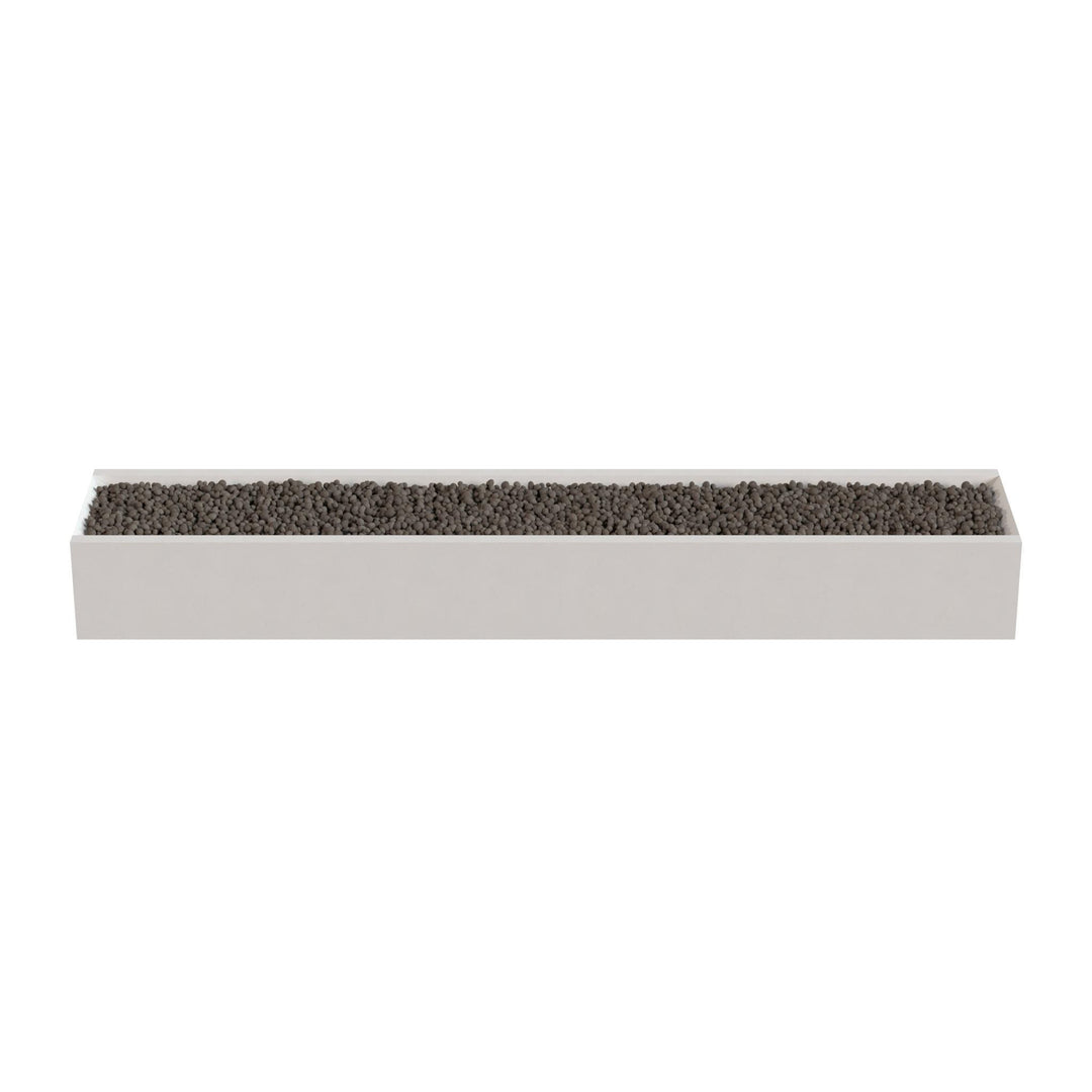 A rectangular planter box filled with small rocks or pebbles.