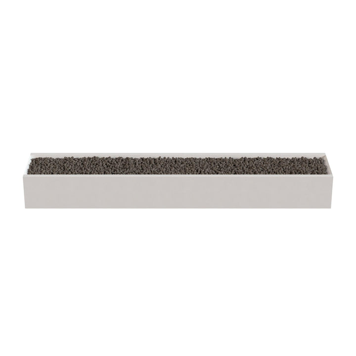 A rectangular planter box filled with small rocks or pebbles.