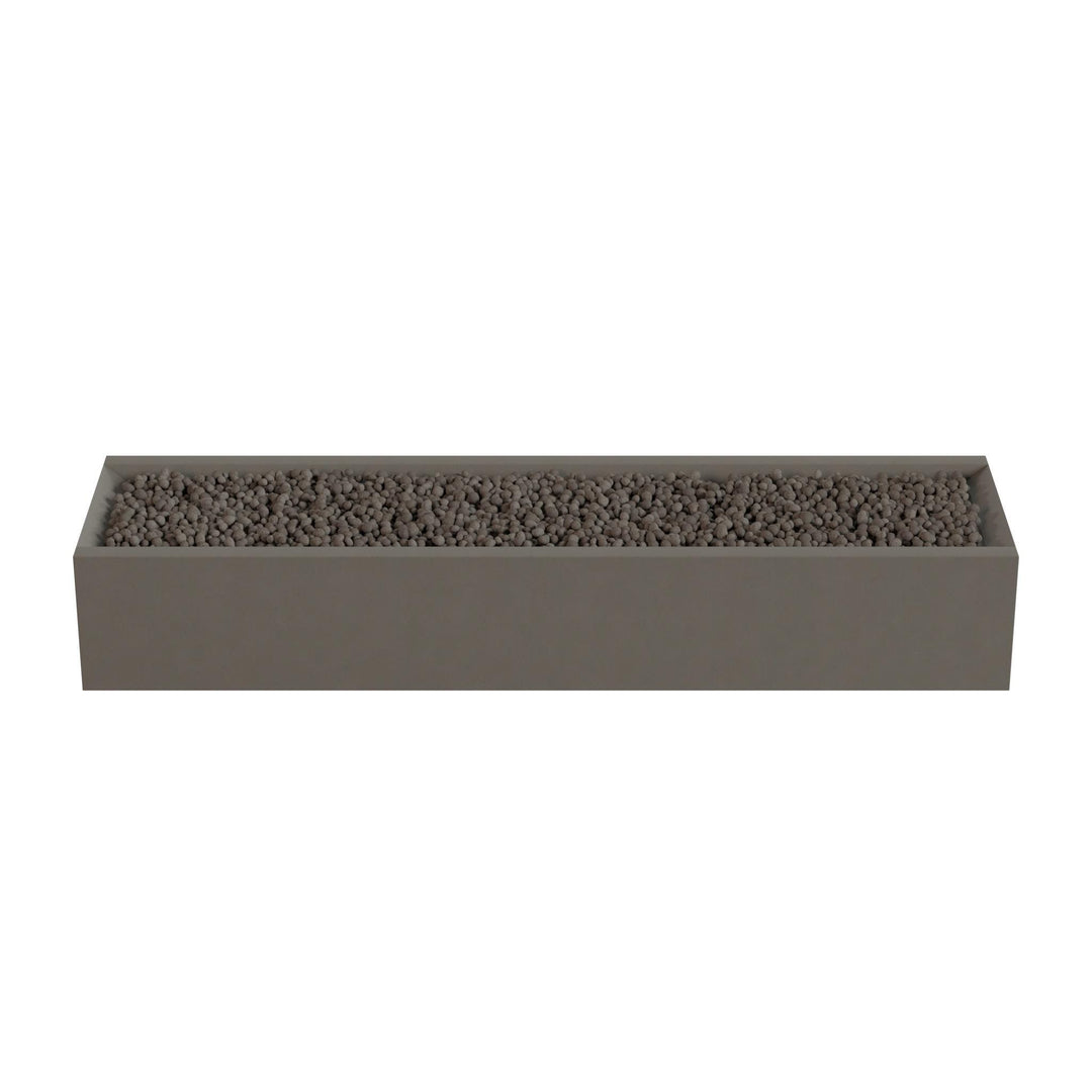 A rectangular planter box filled with small rocks or pebbles.