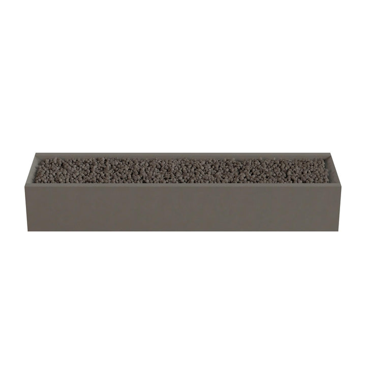 A rectangular planter box filled with small rocks or pebbles.