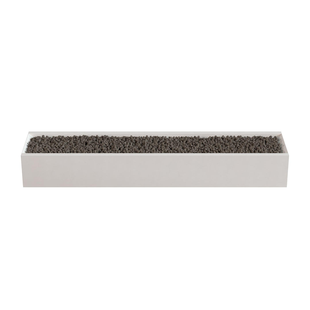 A rectangular planter box filled with small rocks or pebbles.