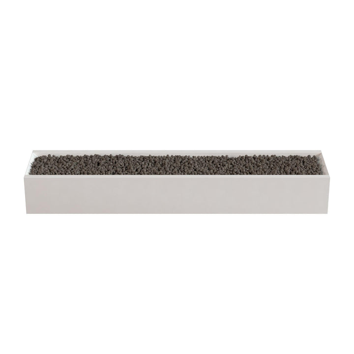 A rectangular planter box filled with small rocks or pebbles.