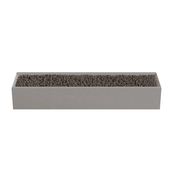 A rectangular planter box filled with small rocks or pebbles.