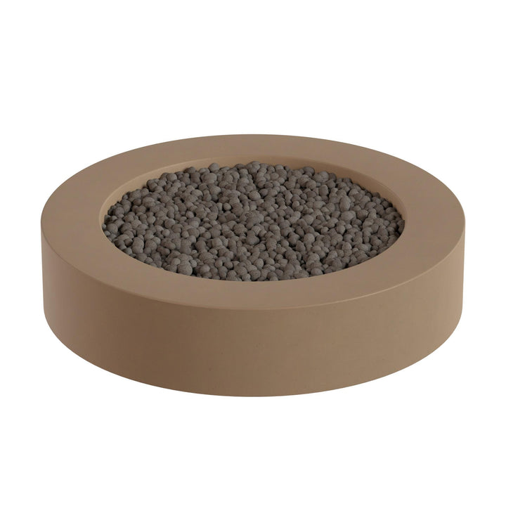 A round, beige-colored container filled with small, dark-colored stones or pebbles.